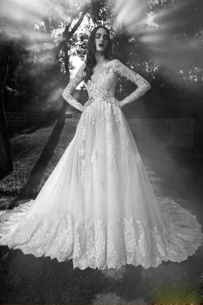 فستان زفاف حالم مزين بالتطريزات الضخمة ودقة التفاصيل التي أعطت